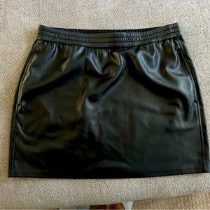 Black leather mini with pockets from Aritzia, never worn